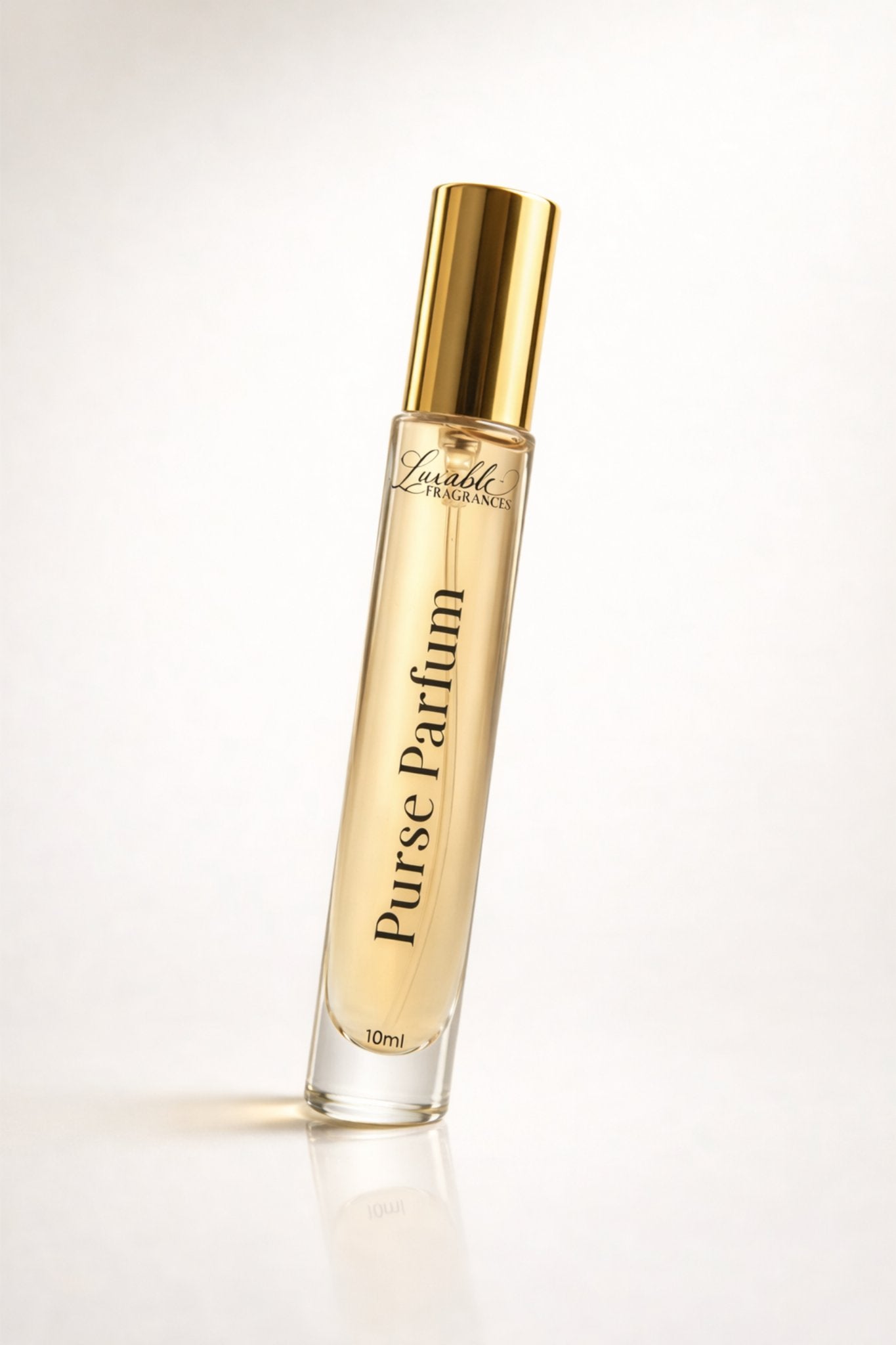 Luxable Fragrances Jahdani’s Laughter purse parfum angled bottle luxury travel perfume spray